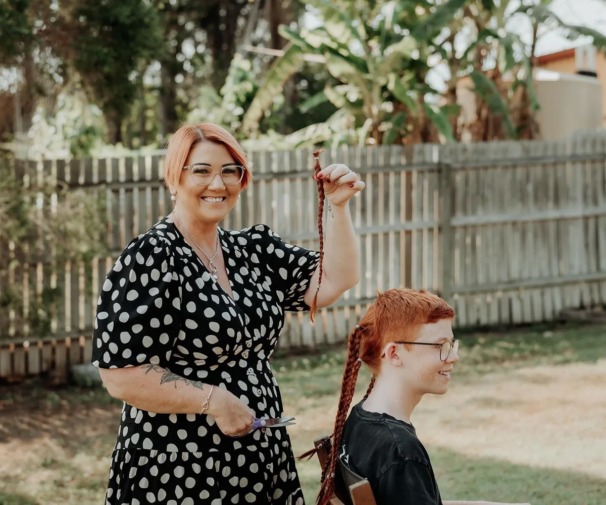 Me cutting Jayce's hair. (Image: Supplied)