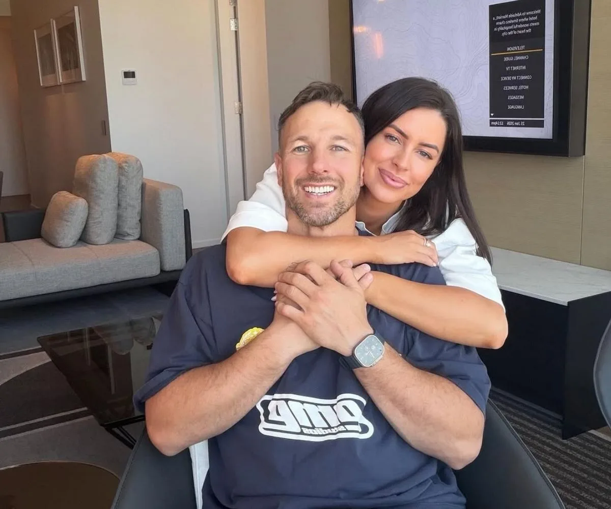 Hiding something? Jeff did his best to cover up Rhi's ring finger! (Image: Instagram)