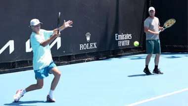 CRUZ HEWITT AND LLEYTON HEWITT ON THE COURT TOGETHER