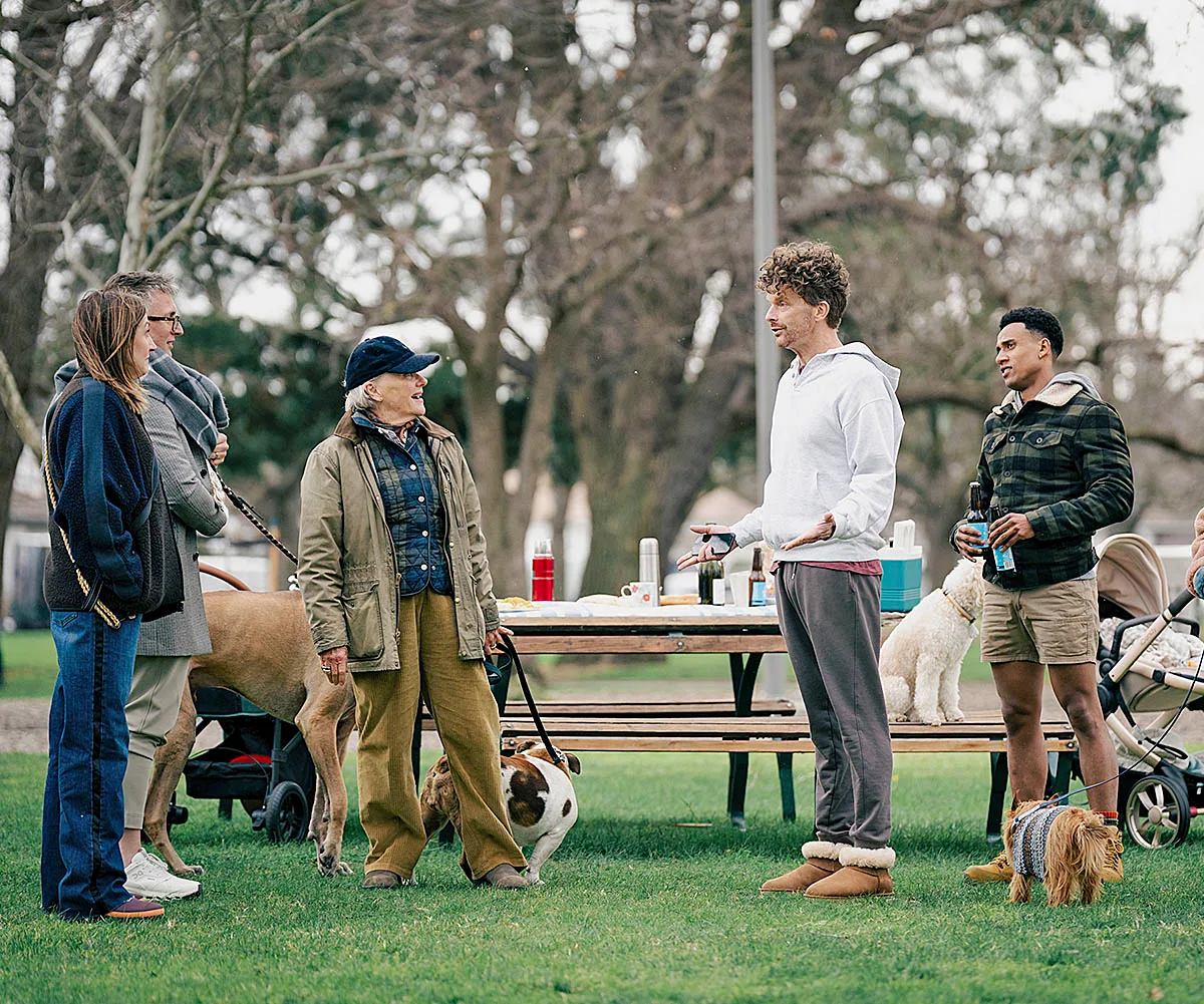 The Dog Park Divas gather at the dog park.