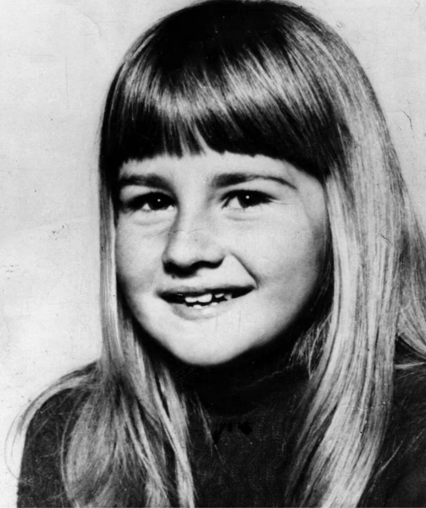 A black and white image of a young girl