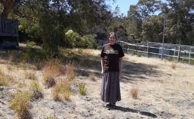 Kathleen Murray proudly wears her t-shirt out in her yard. (Image: Supplied)
