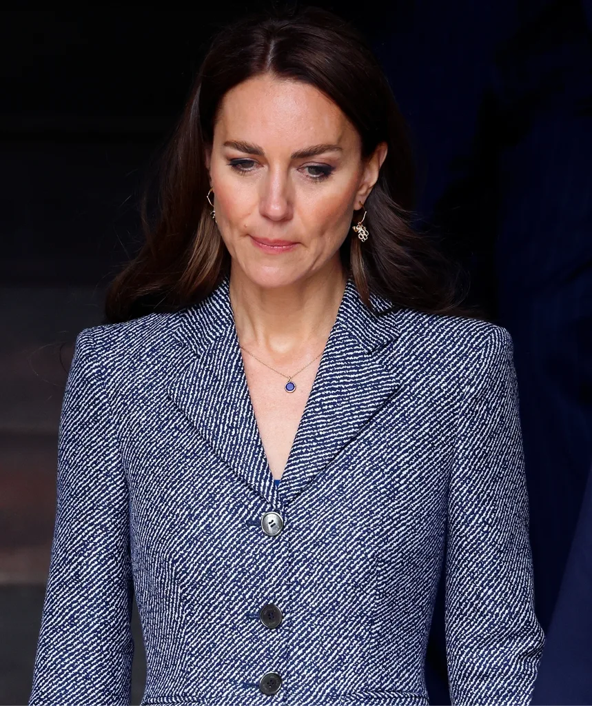 Kate, the Princess of Wales, pictured in an elegant blue and white tweed coat dress.