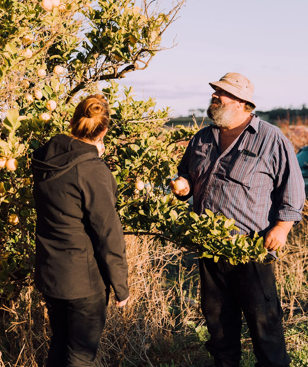 Me out on the orchard with farmer Don Martin. (Image: Supplied)