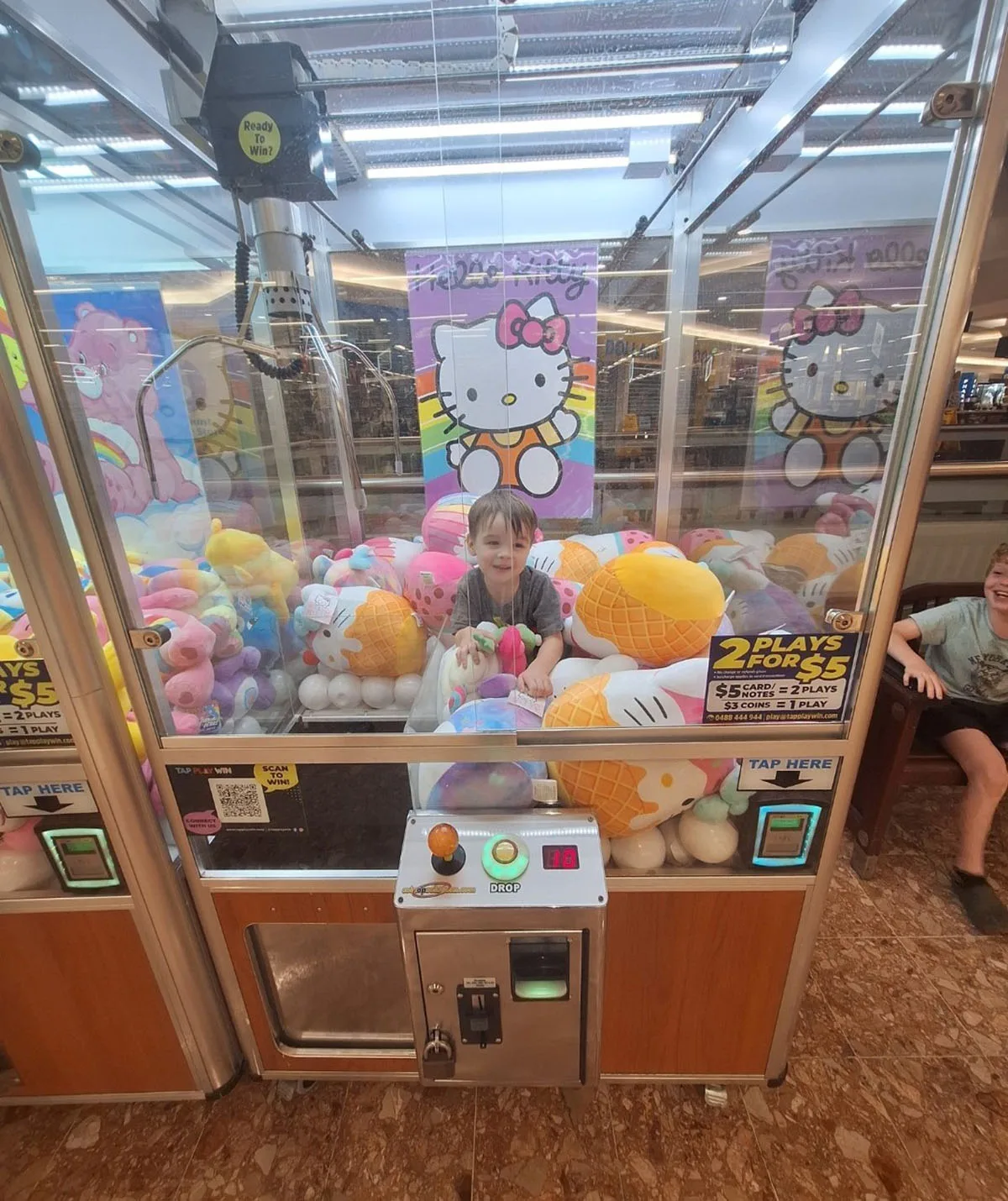 Ethan after climbing inside the toy machine. (Image: Supplied)
