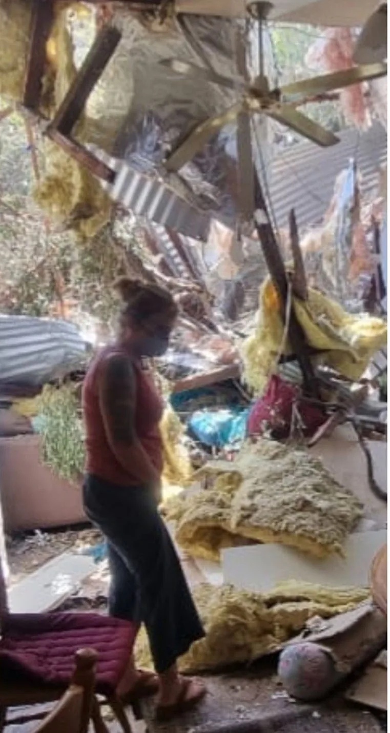 Me cleaning up after the storm. (image: Supplied)