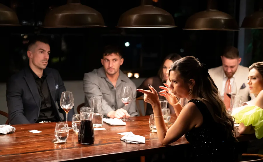 Bec at the MAFS dinner party mid argument.