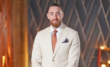Danny from MAFS in a cream suit behind the scenes at a Dinner Party.
