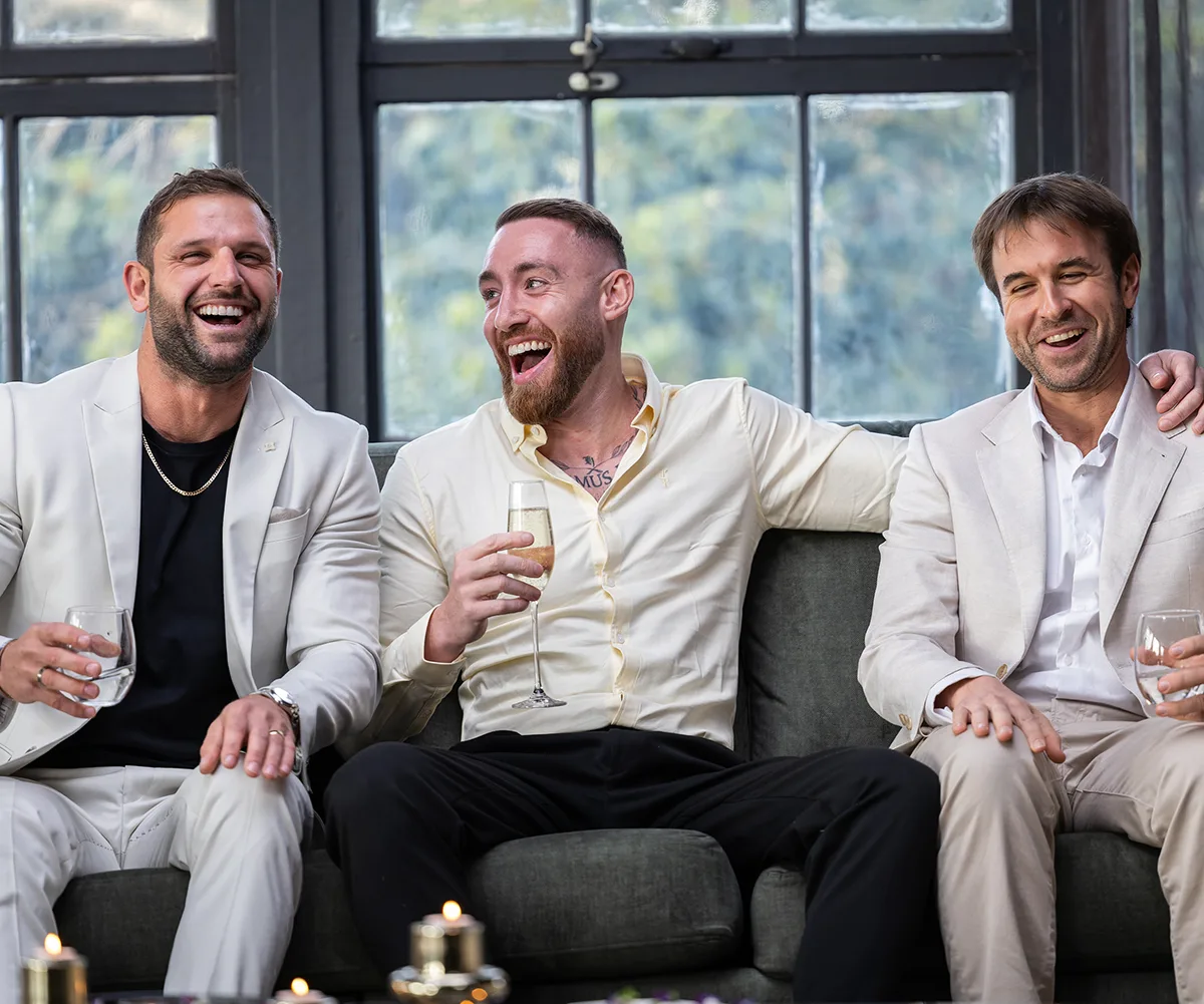 Danny from MAFS sits in between Scott (left) and Stephen (right). They are all smiles before entering the official dinner party.