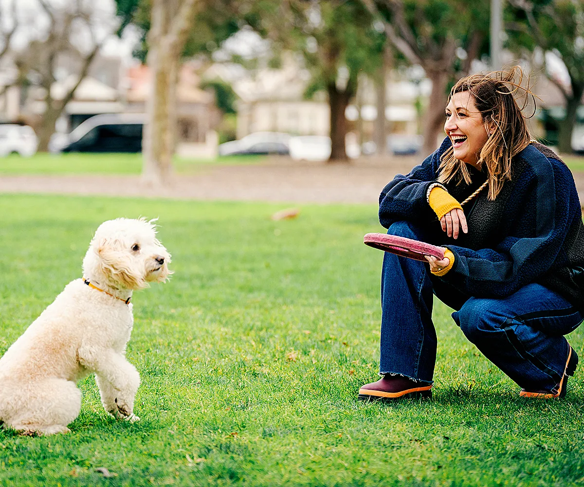 Celia as Samantha with dog Beattie in Dog Park.