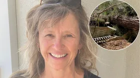 Sarah Teague and the tree that destroyed her home. (Image: Supplied)