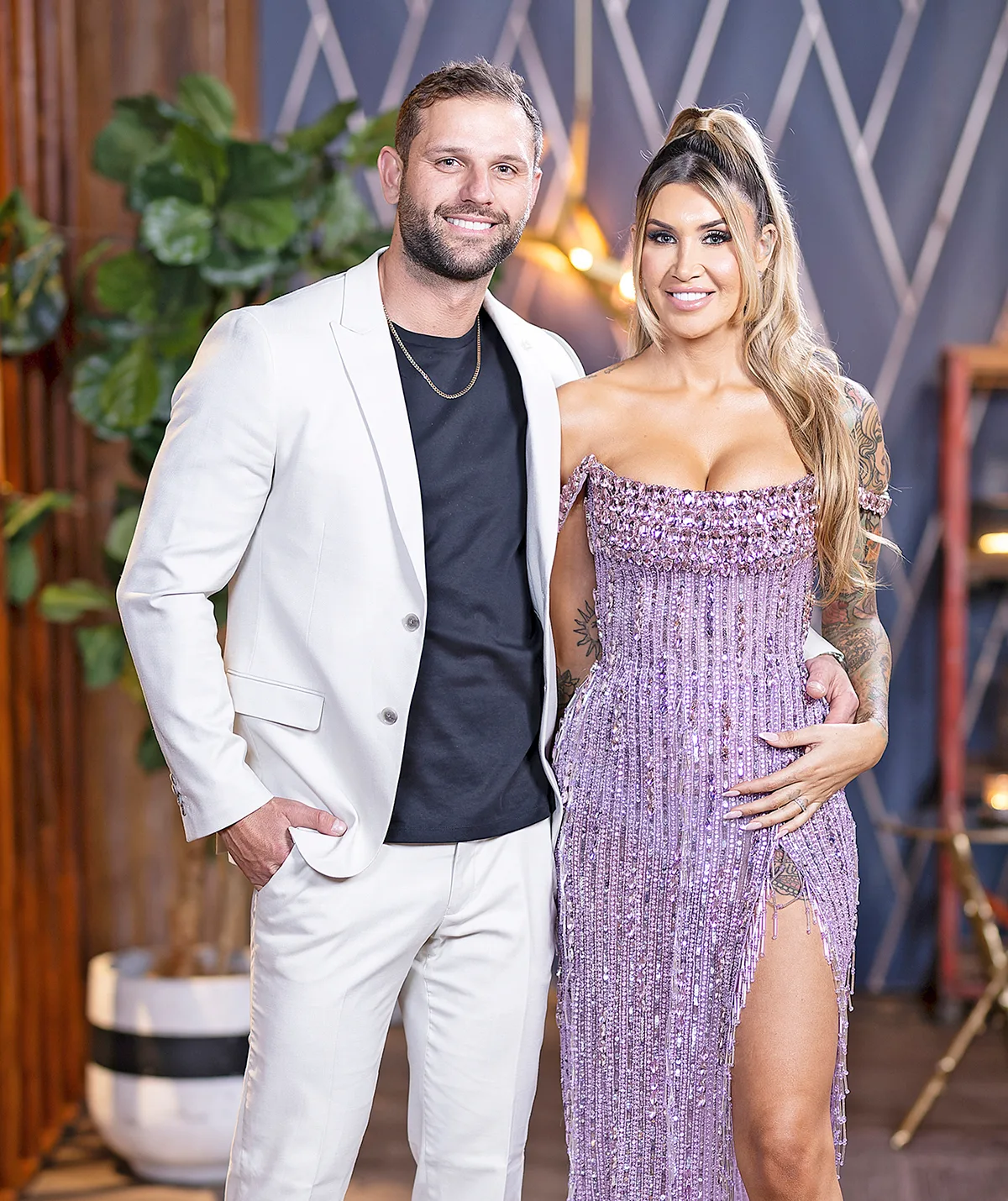 Scott and Gia - MAFS' 'happiest couple' - pose dressed up at a Dinner Party.