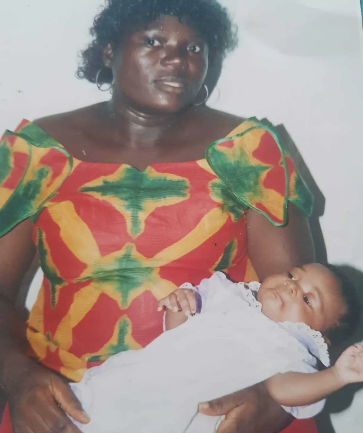 Wanwue pictured with her mother as a baby.