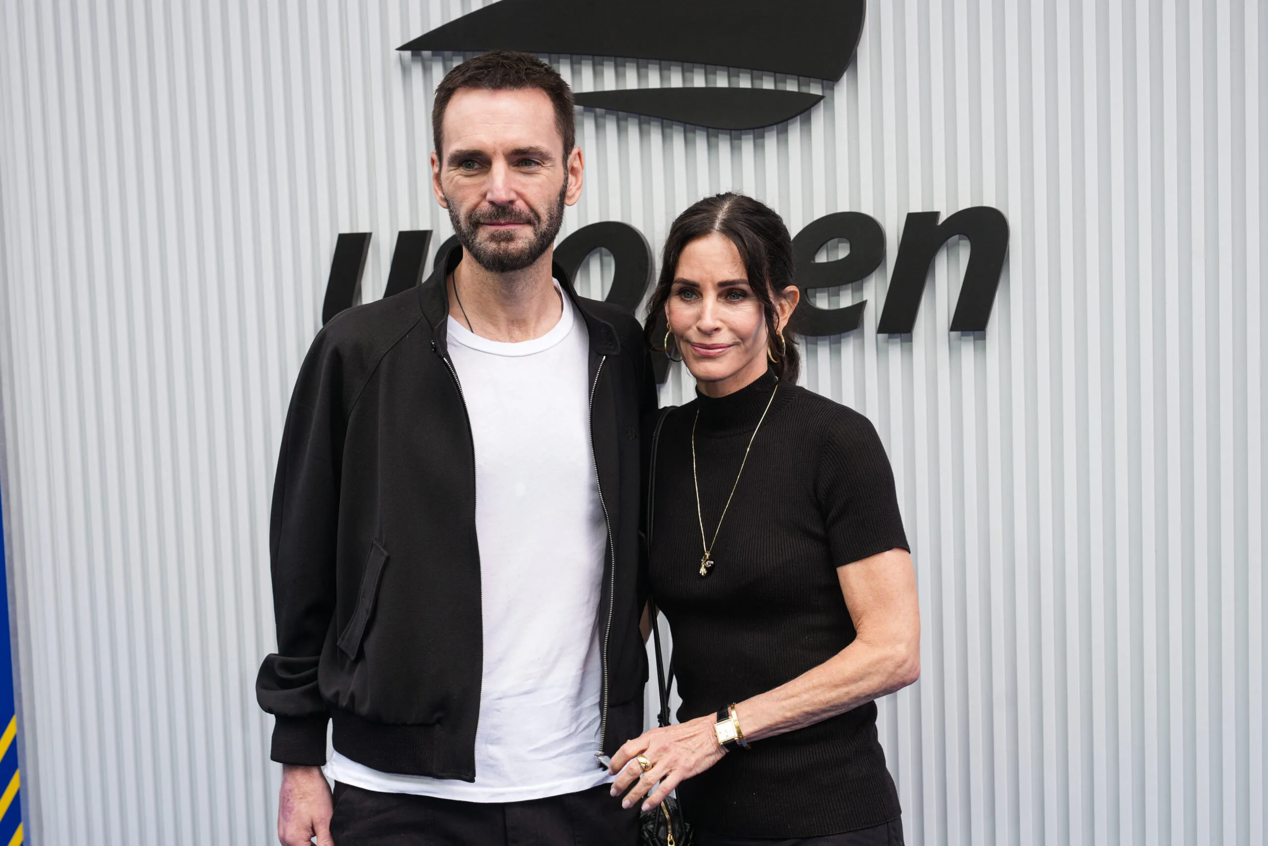 Johnny McDaid and Courteney Cox attend the US Open in New York in September 2025