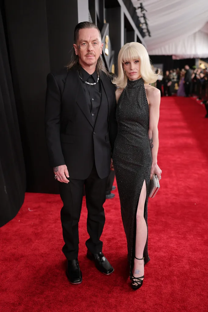 Sid Wilson and Kelly Osbourne attend the Grammy Awards on February 1