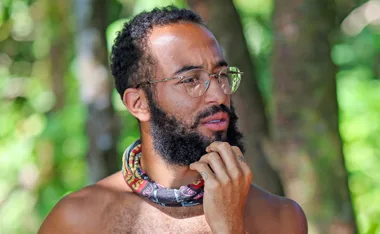 Cameron, with his Survivor buff around his neck, looks thoughtful