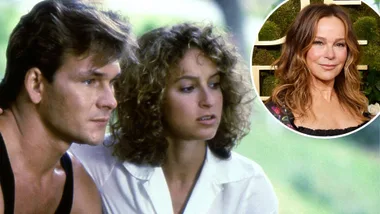 A man and a woman look off camera.