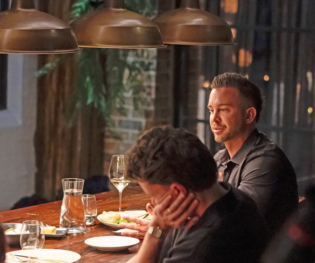 Chris and Sam at the MAFS dinner party table.