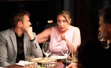 Rachel (right) next to husband Stephen at the MAFS dinner party.
