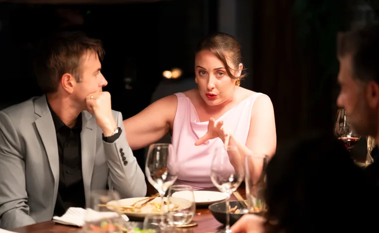 Rachel (right) next to husband Stephen at the MAFS dinner party.
