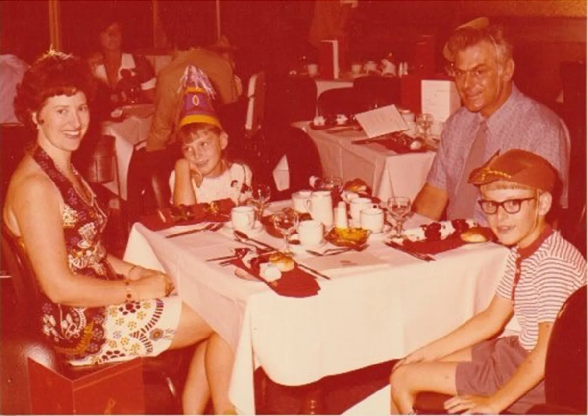 Jackie (Mum), me, Robert (Dad), Phillip (brother) - this was taken at one of the few shared dinners on the boat. (Image: Supplied)