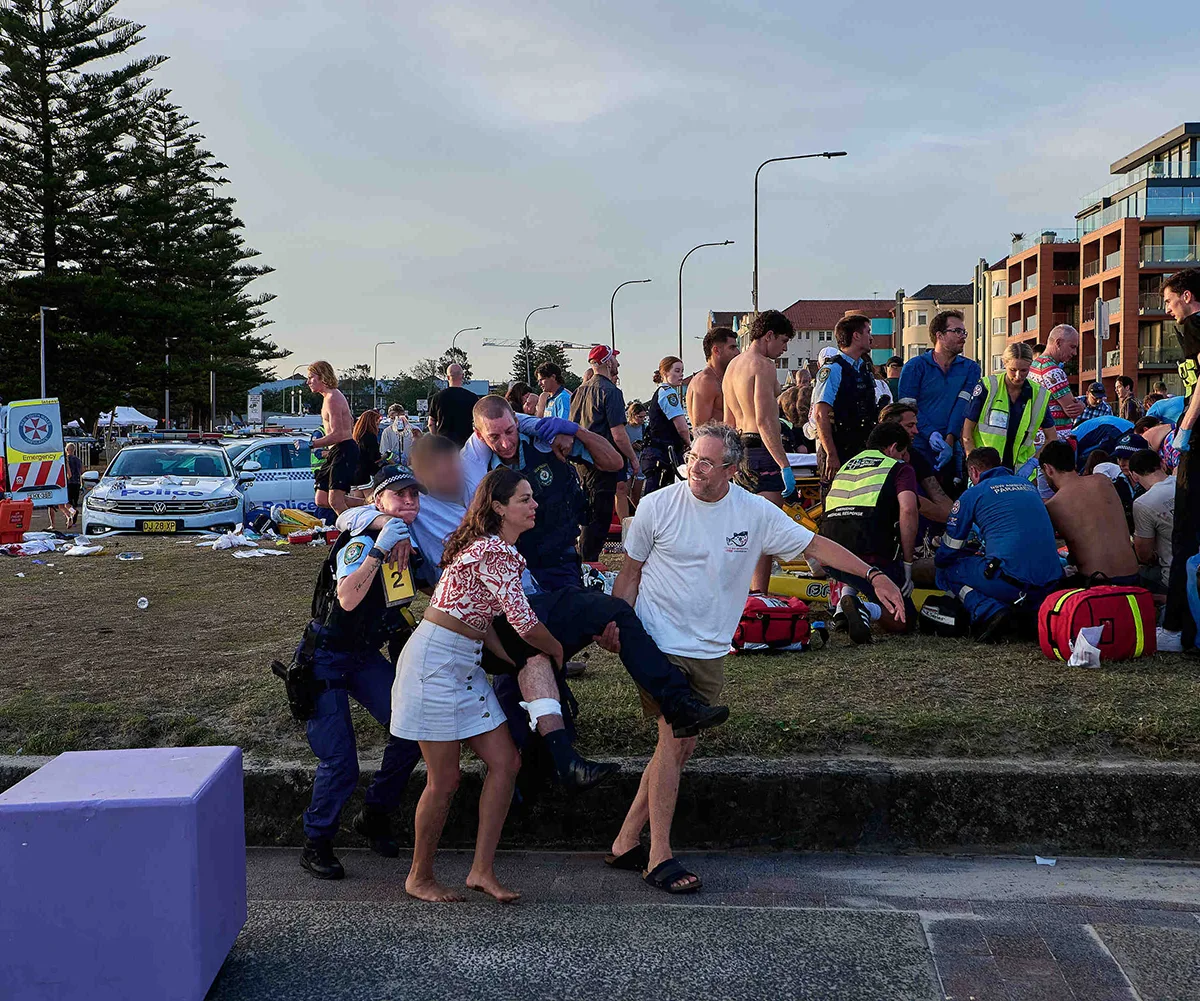 Jimmy and I helping victims down at Bond Beach after the shootingi. (Image: Fairfax)