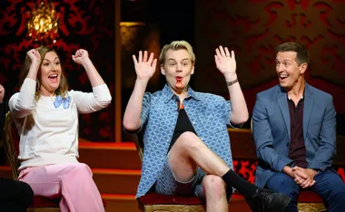 Celia Pacquola and Joel Creasey have their hands up in the air while Rove McManus looks at them