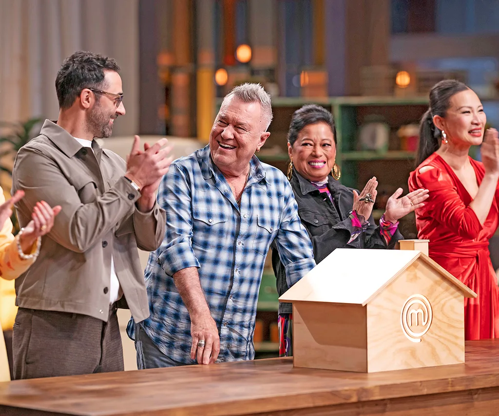 Andy Allen standing with Jimmy Barnes in the MasterChef Australia kitchen.