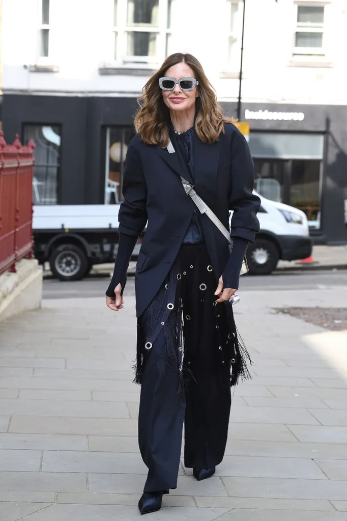 Trinny Woodall walking in london - winter layer outfit