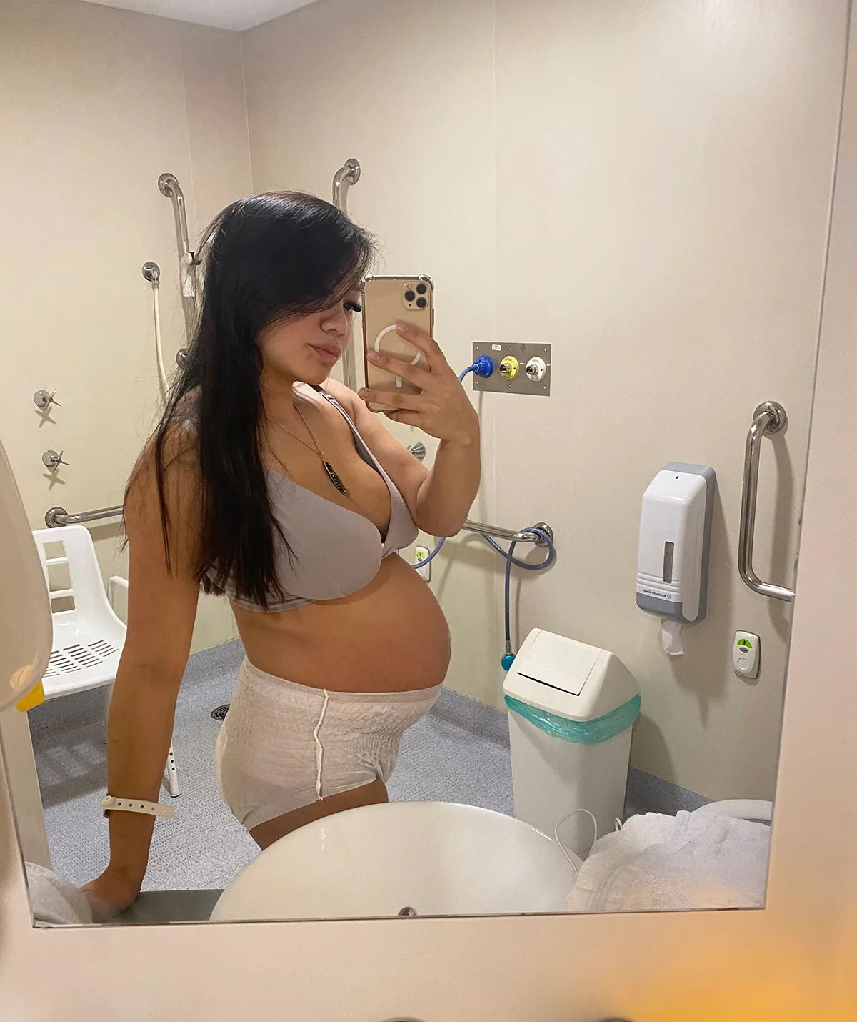 Me filming while pregnant in hospital. (Image: Supplied)