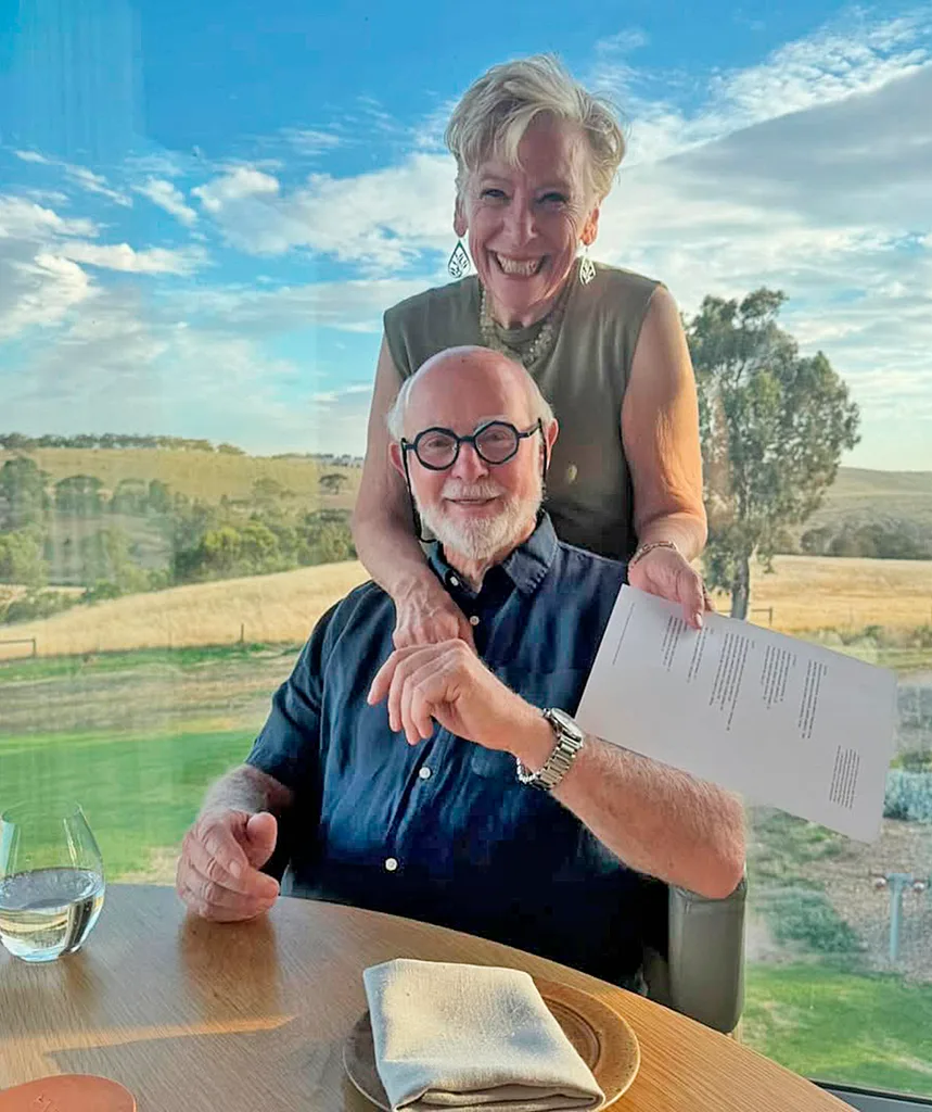 Maggie Beer with her arms around husband Colin.
