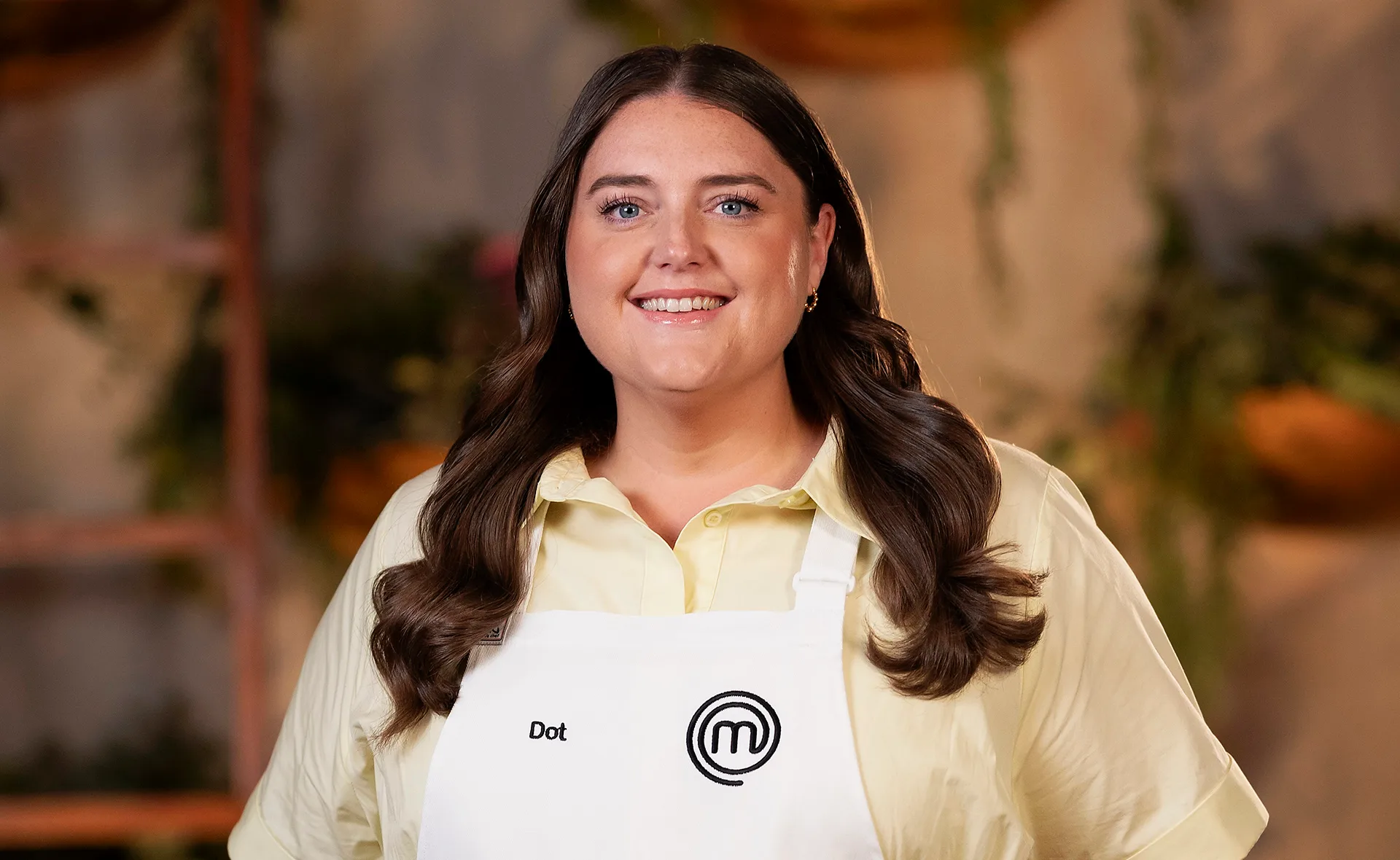 MasterChef Australia's Dot McHugh in the kitchen with her white apron on.