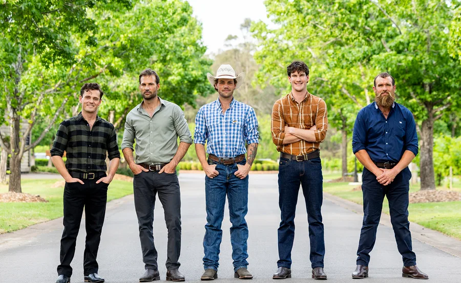 Farmers Alex, Jarrad, Dylan, Zac and Jason stand next to each other on the road