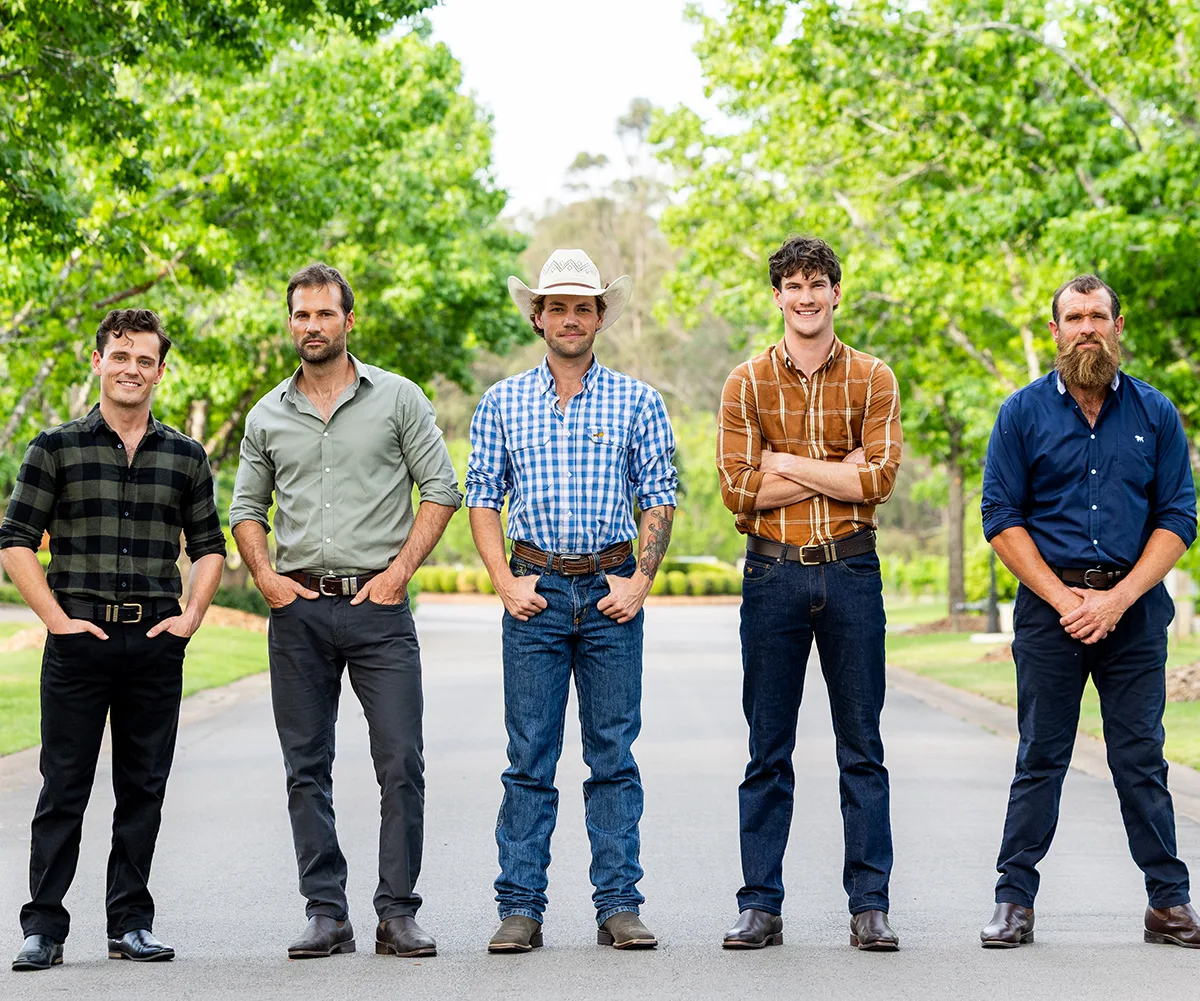 Alex, Jarrad, Dylan, Zac and Jason stand on a road 