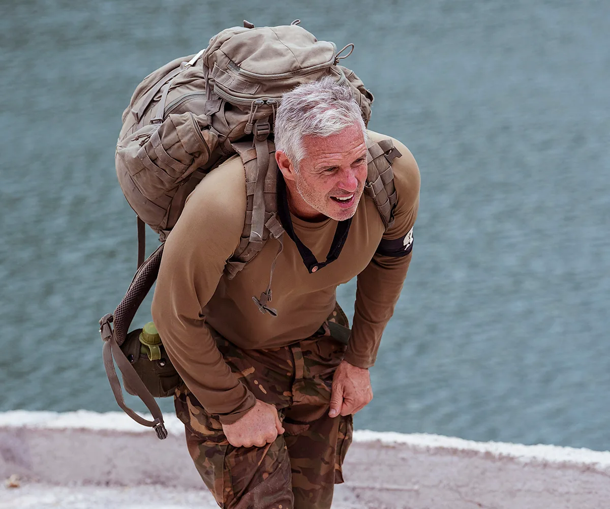 Pictured: Brad Hodge running up dam road after Double Drop Rappel on SAS: Australia vs England.