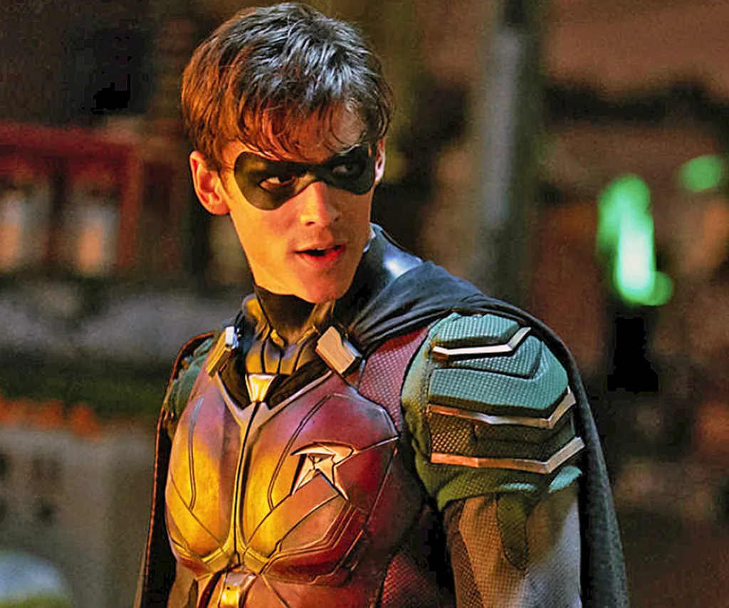 Brenton in character, wearing a mask over his eyes, on the set of Titans