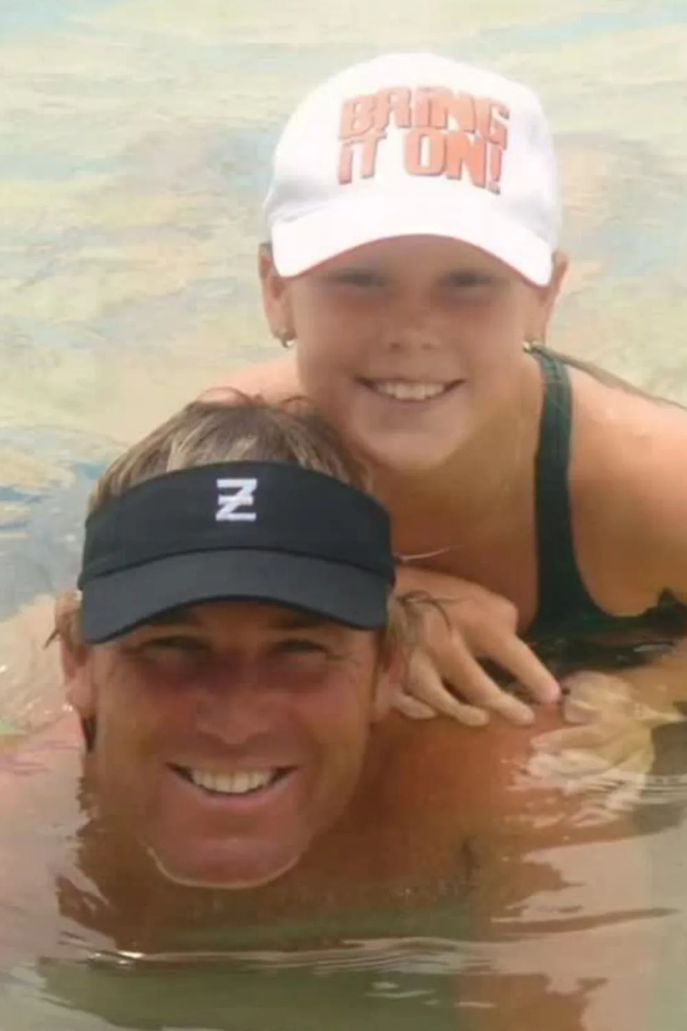Shane Warne with daughter Brooke as a child