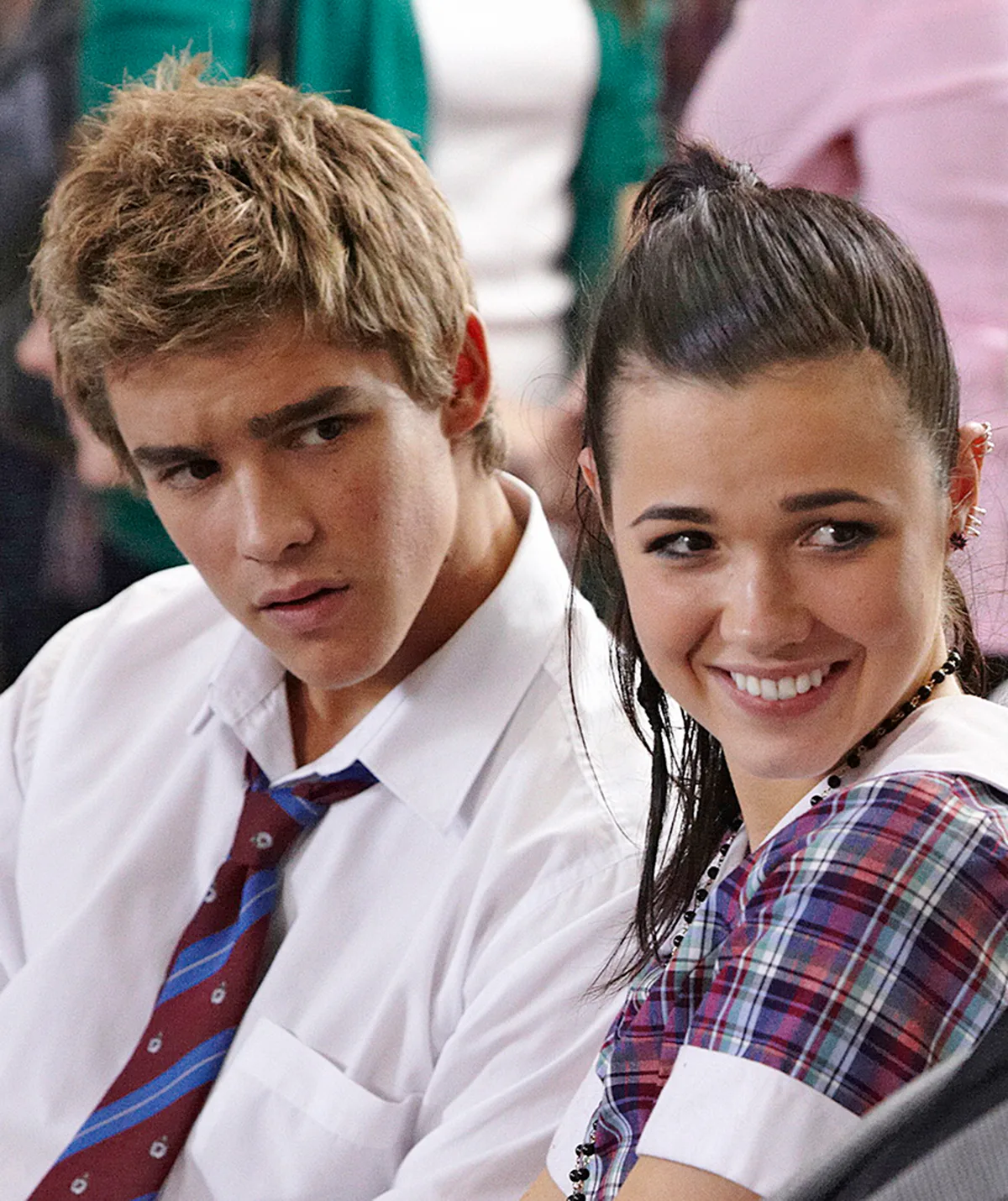 Brenton and Demi Harman, both in school uniforms, in character on Home And Away