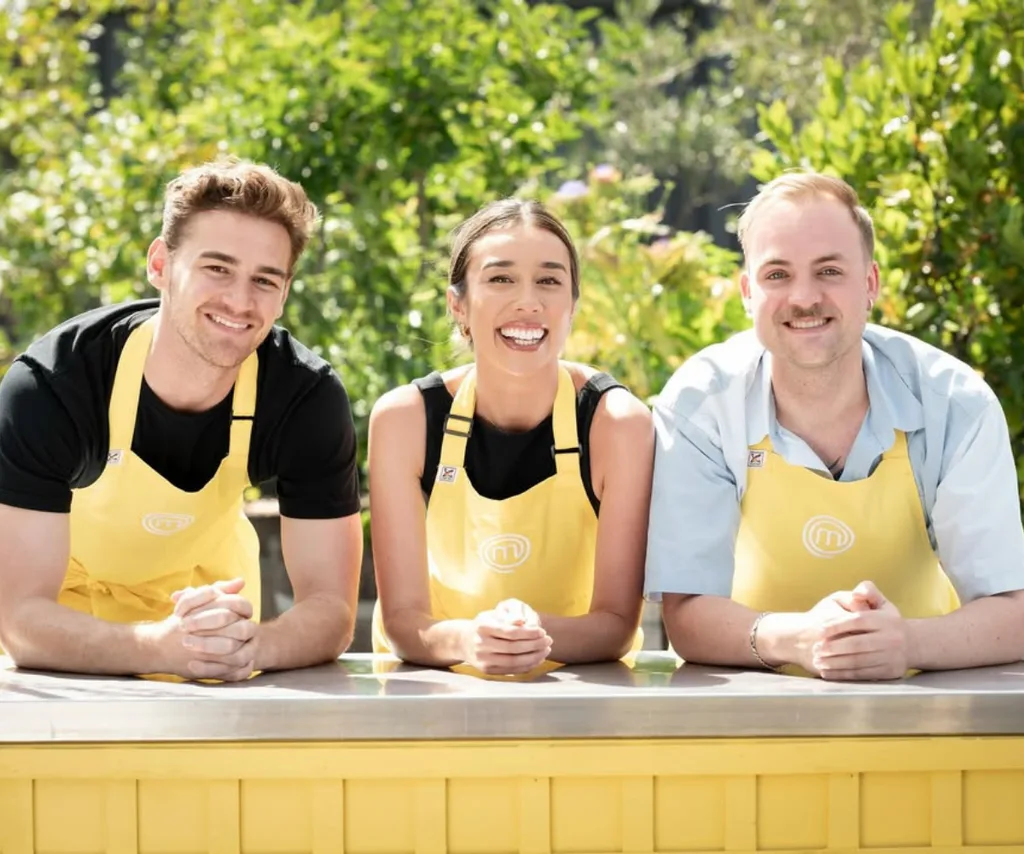 Jack, Lucy and Casper wearing yellow aprons for a team service challenge on MasterChef Australia.