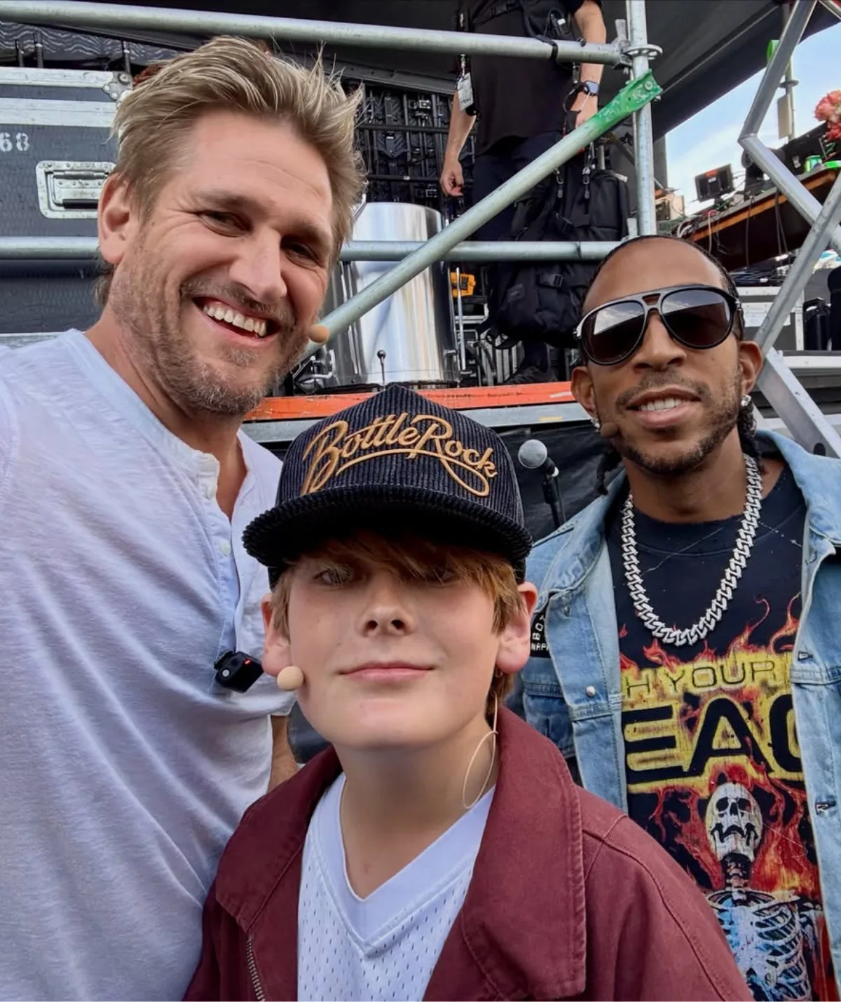 Curtis Stone with his son Emerson and rapper Ludacris backstage at BottleRock festival.