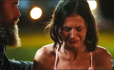 A teary Beth is sitting next to Jason
