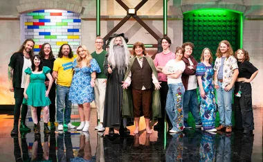 The cast of Lego Masters Bricktacular 2026 with Hamish Blake and Brickman dressed as Gandalf and Frodo.