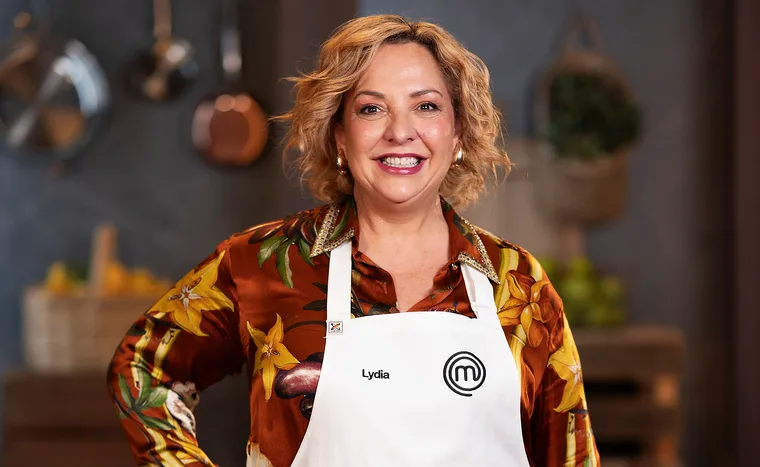 Lydia Kamperos smiling in the MasterChef Australia kitchen.