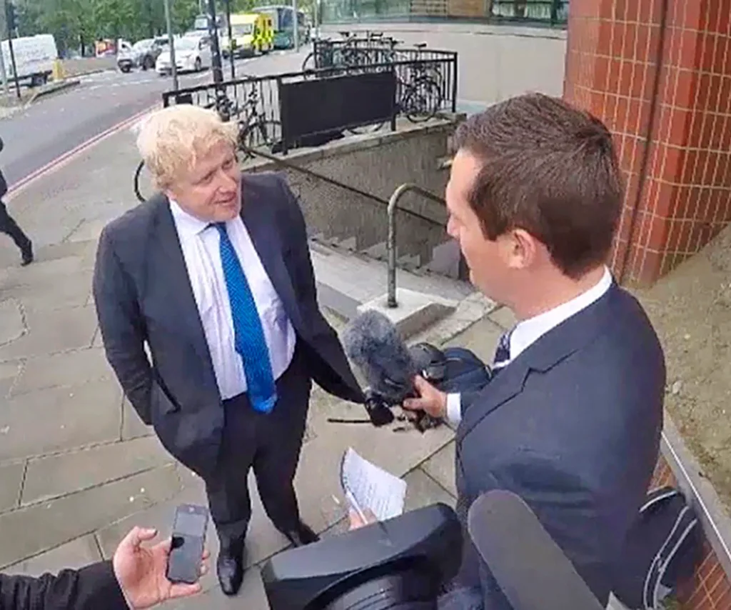 James chats to British politician Boris Johnson in the street