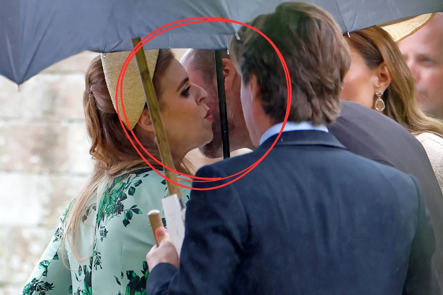 Prince William kisses Princess Beatrice on the cheek