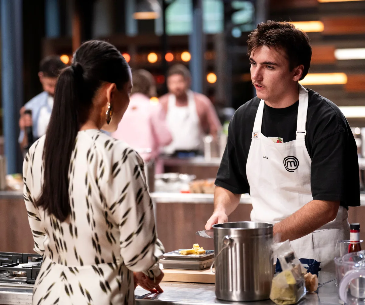 Poh Ling Yeow visiting Luke Harris mid cook at his MasterChef Australia kitchen bench.