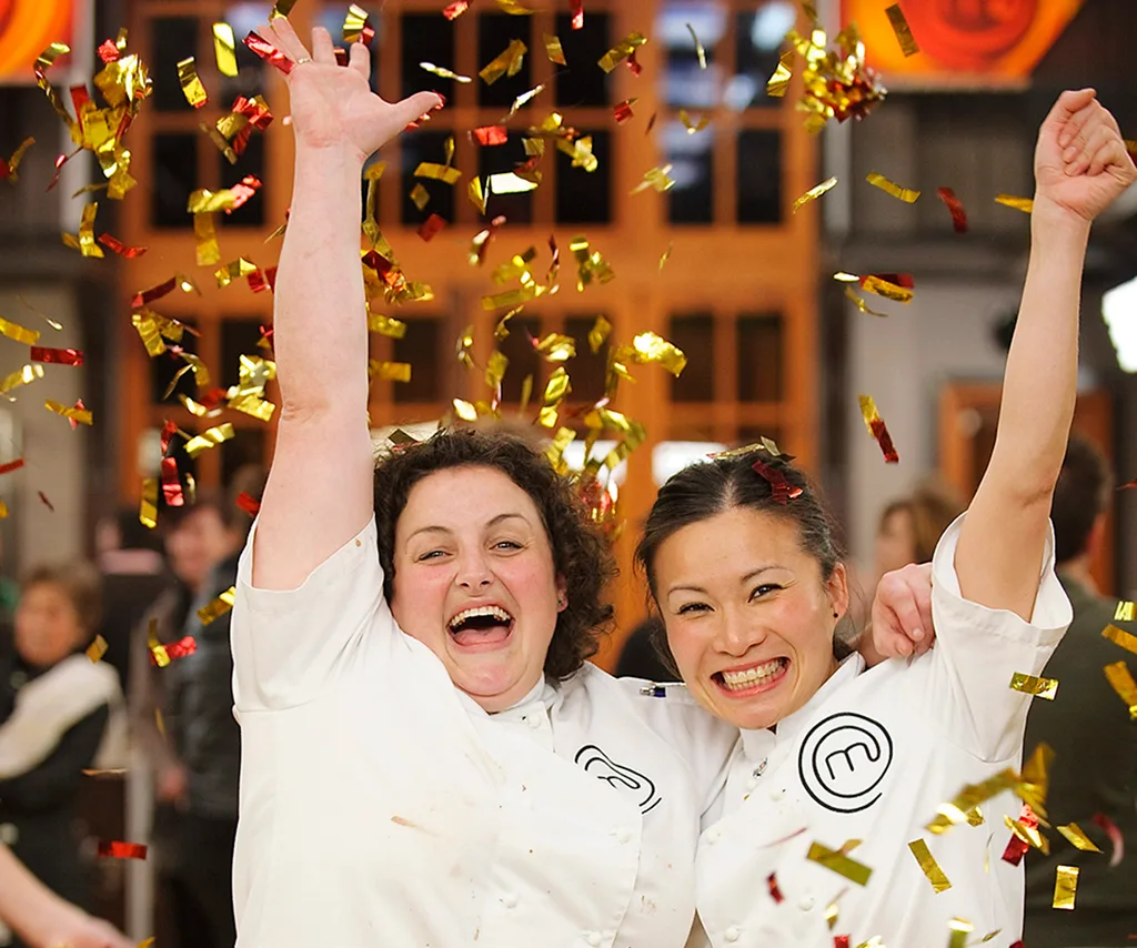 Julie Goodwin and Poh Ling Yeow celebrating the MasterChef Australia finale.