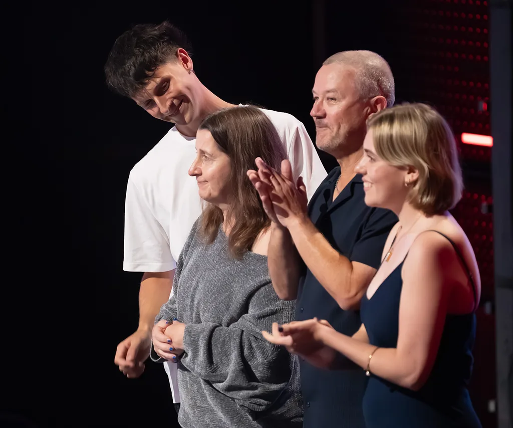 Charlotte's family stand on the sidelines of The Voice, watching her