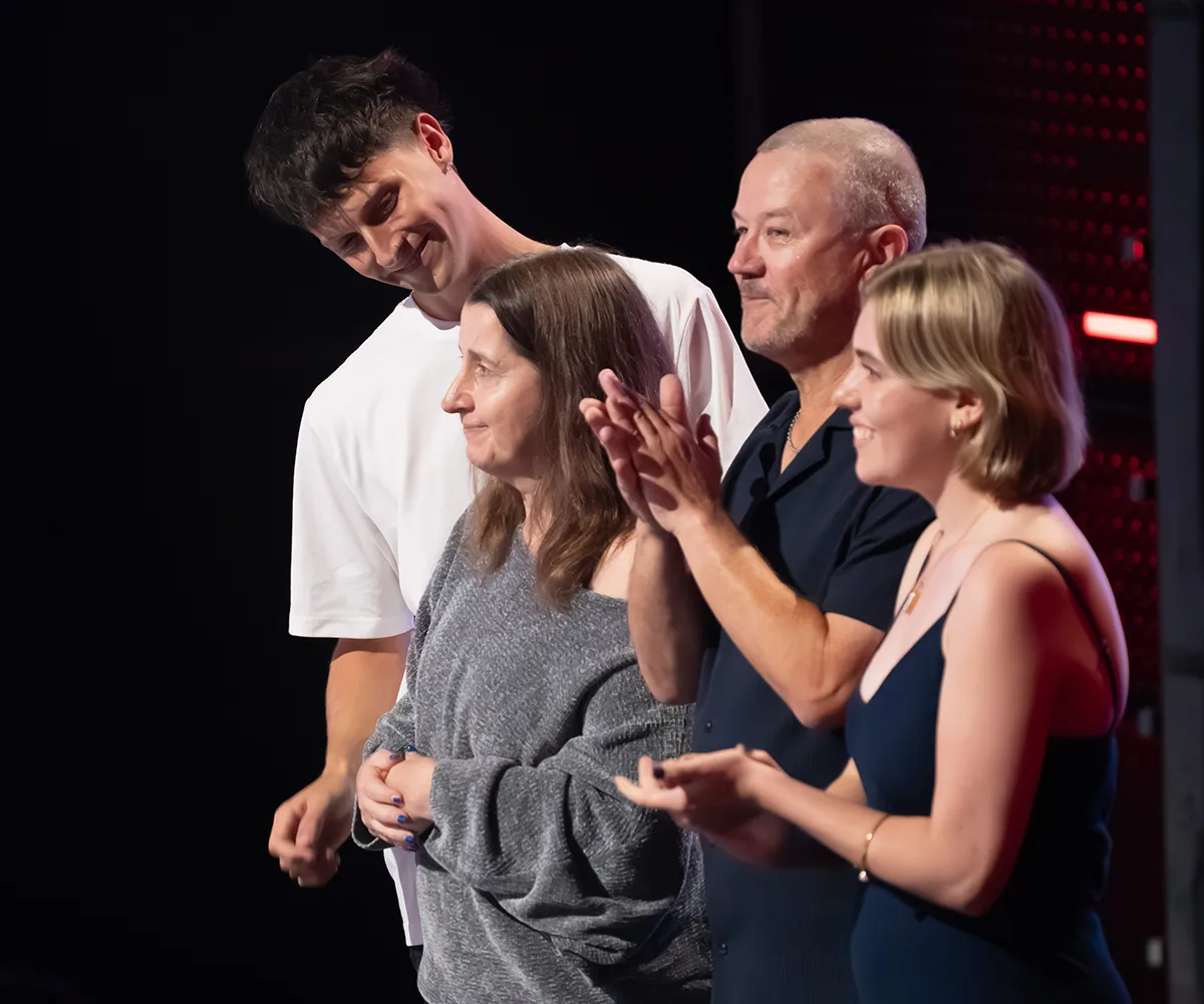 Charlotte's family stand on the sidelines of The Voice, watching her