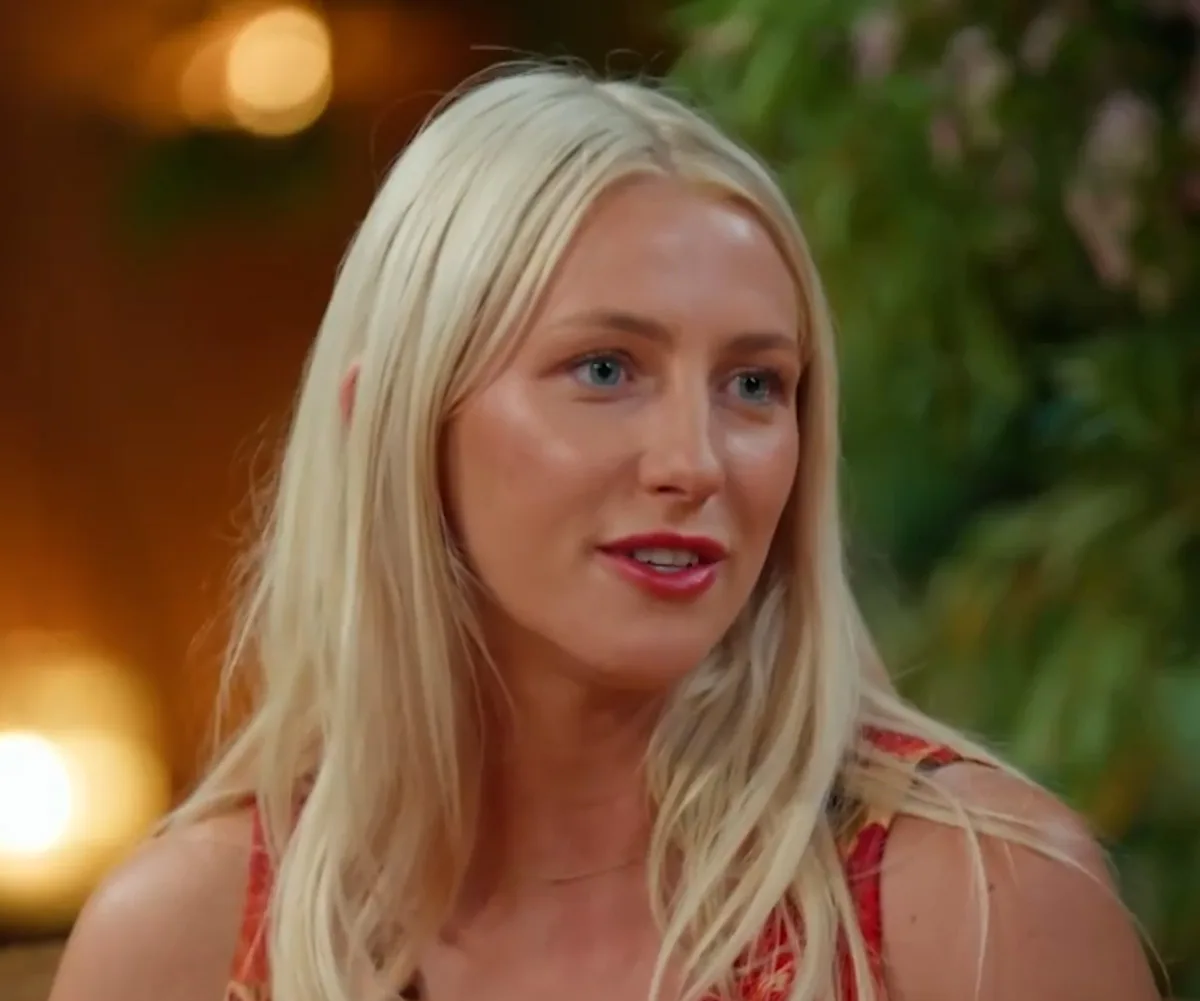 A close-up of Eddy, talking, at the reunion